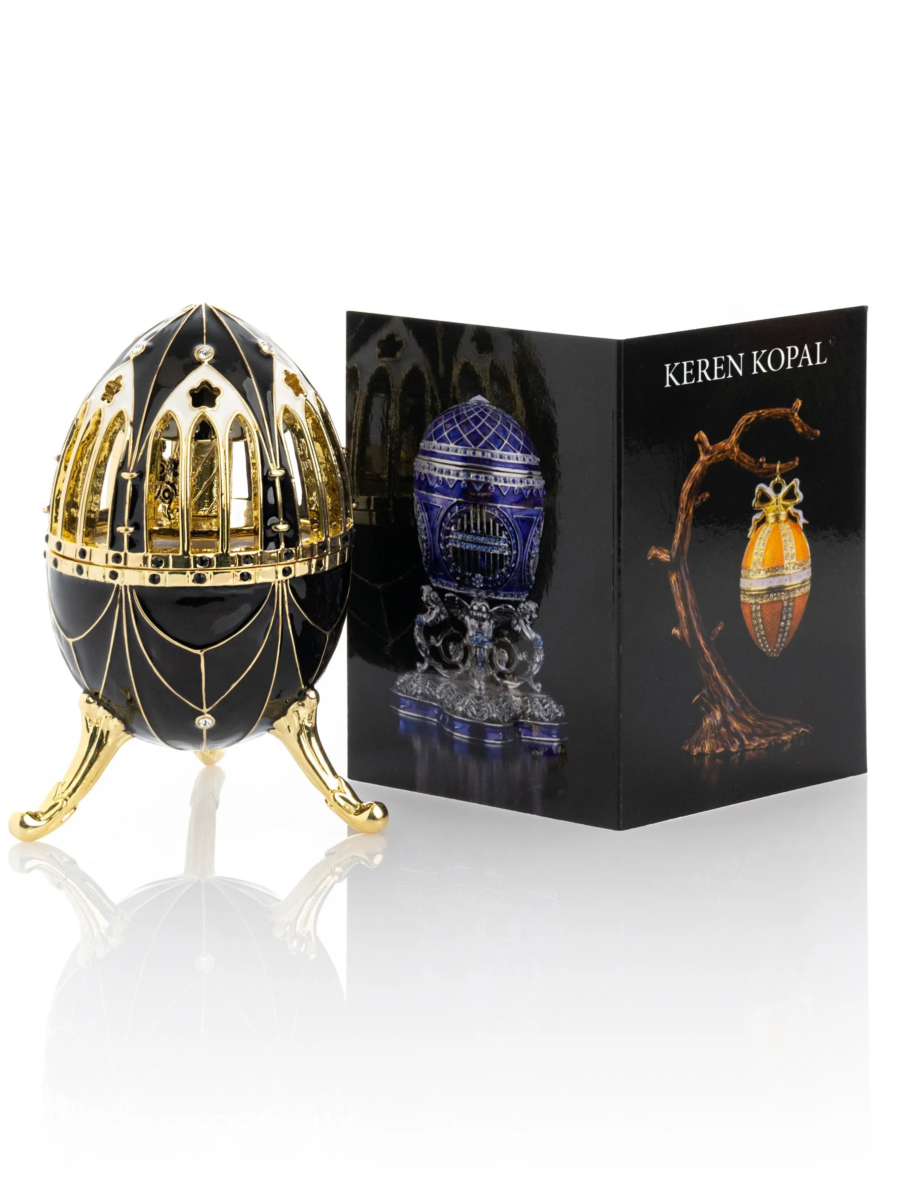 Black and Gold Faberge Egg with Horse Carousel Surprise Inside
