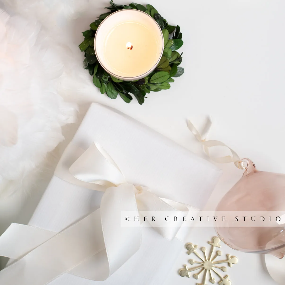 Holiday Gift & Candle on White Background