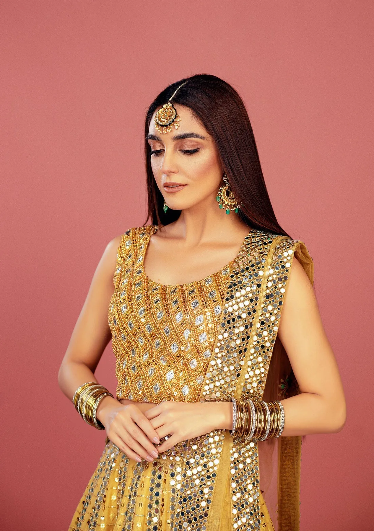 Mirror worked Pakistani Bridal Yellow Lehenga Choli