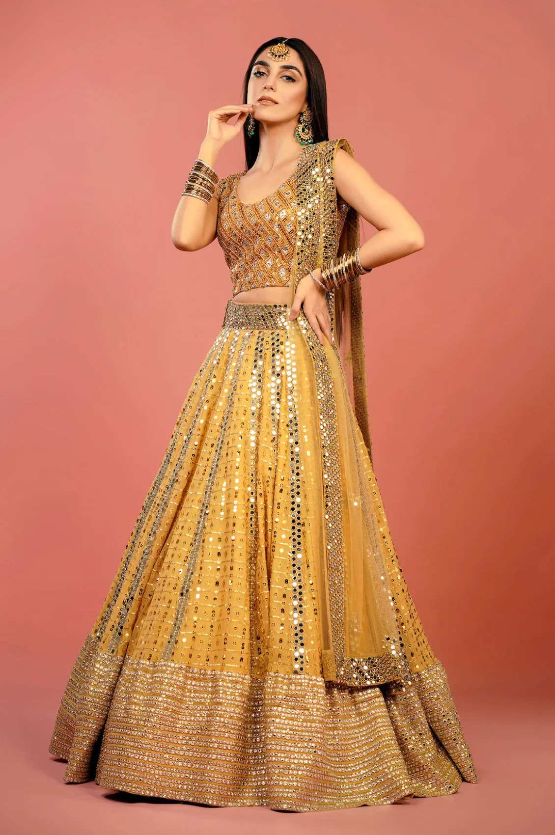 Mirror worked Pakistani Bridal Yellow Lehenga Choli