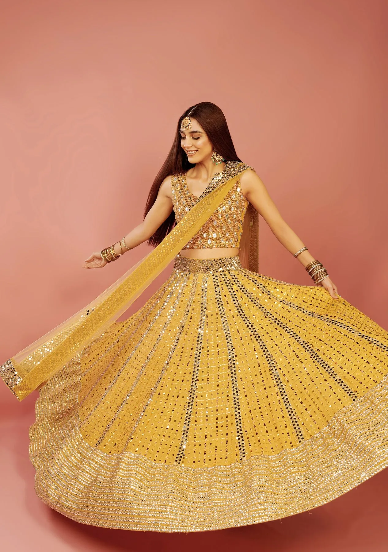 Mirror worked Pakistani Bridal Yellow Lehenga Choli