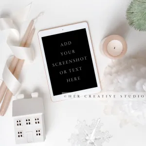 Tablet with Holiday Tree & Candle on White Background