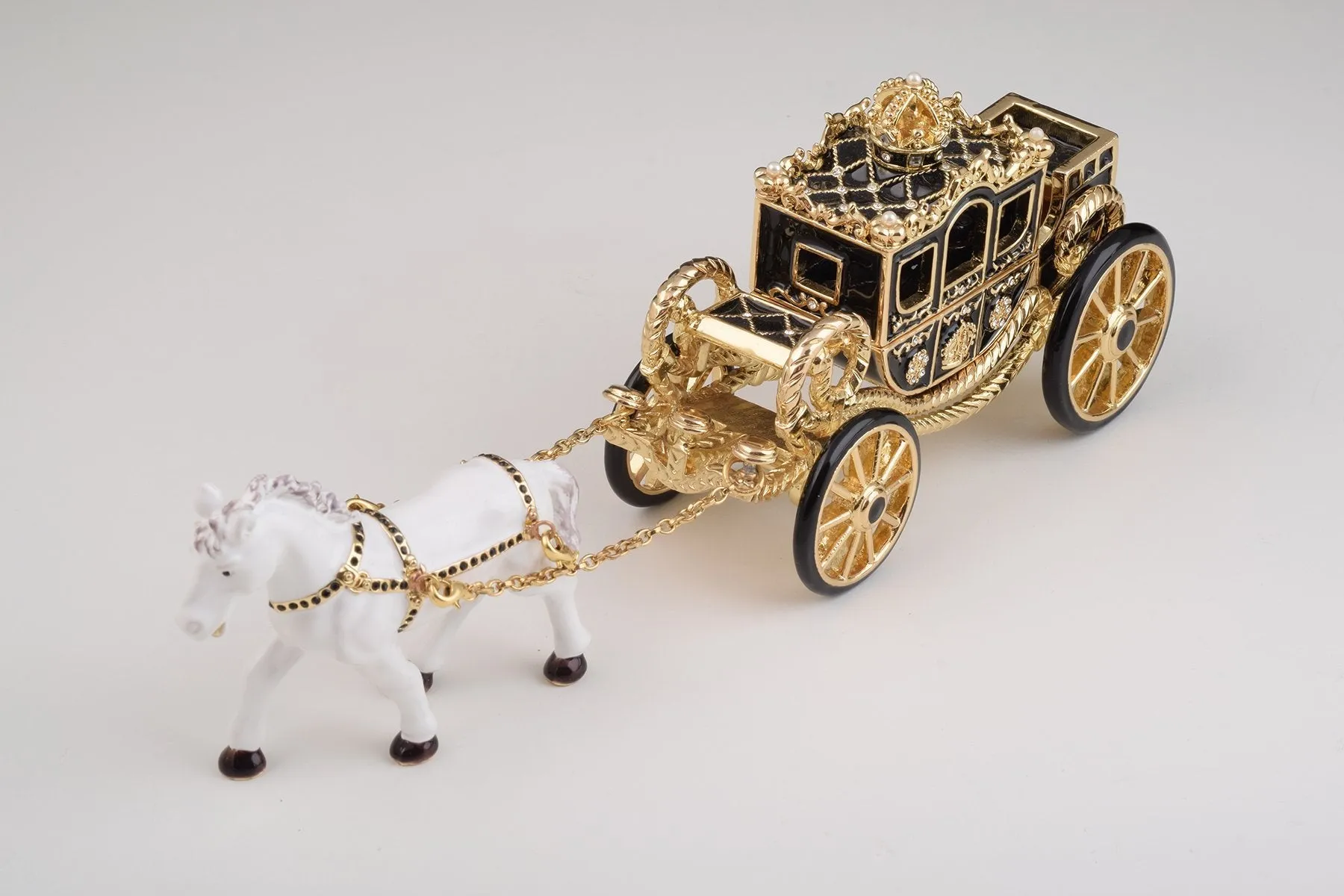 White Horse Pulling a Golden Carriage