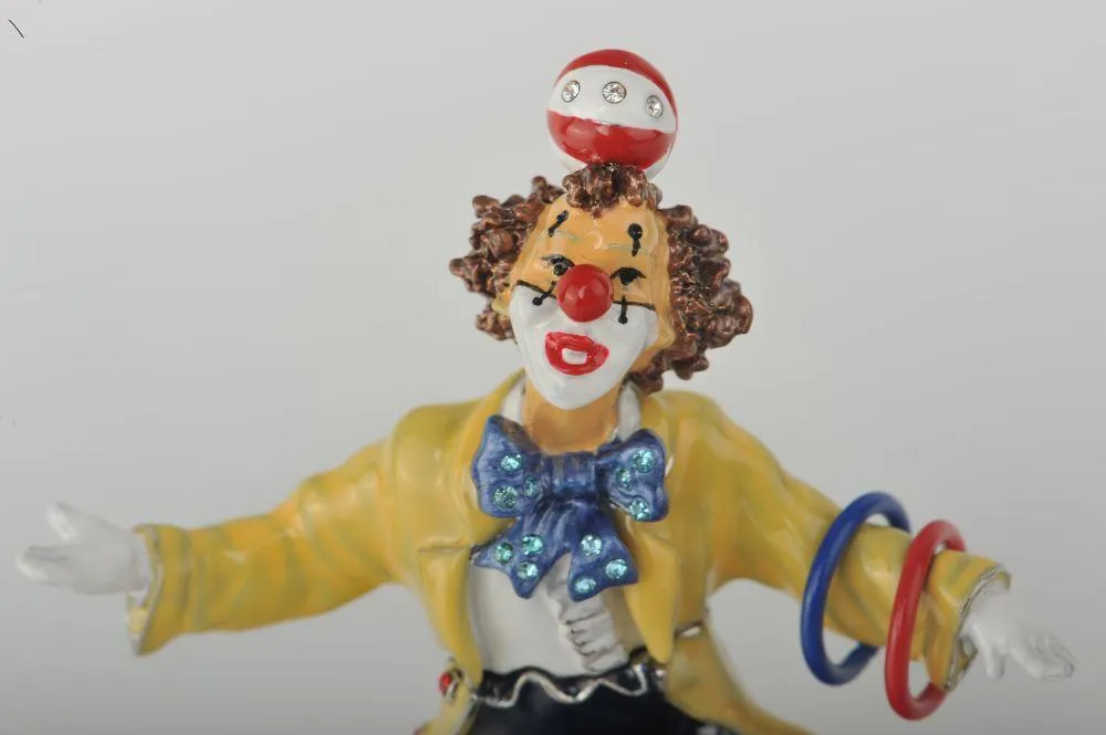 Yellow Circus Clown Juggling on Unicycle